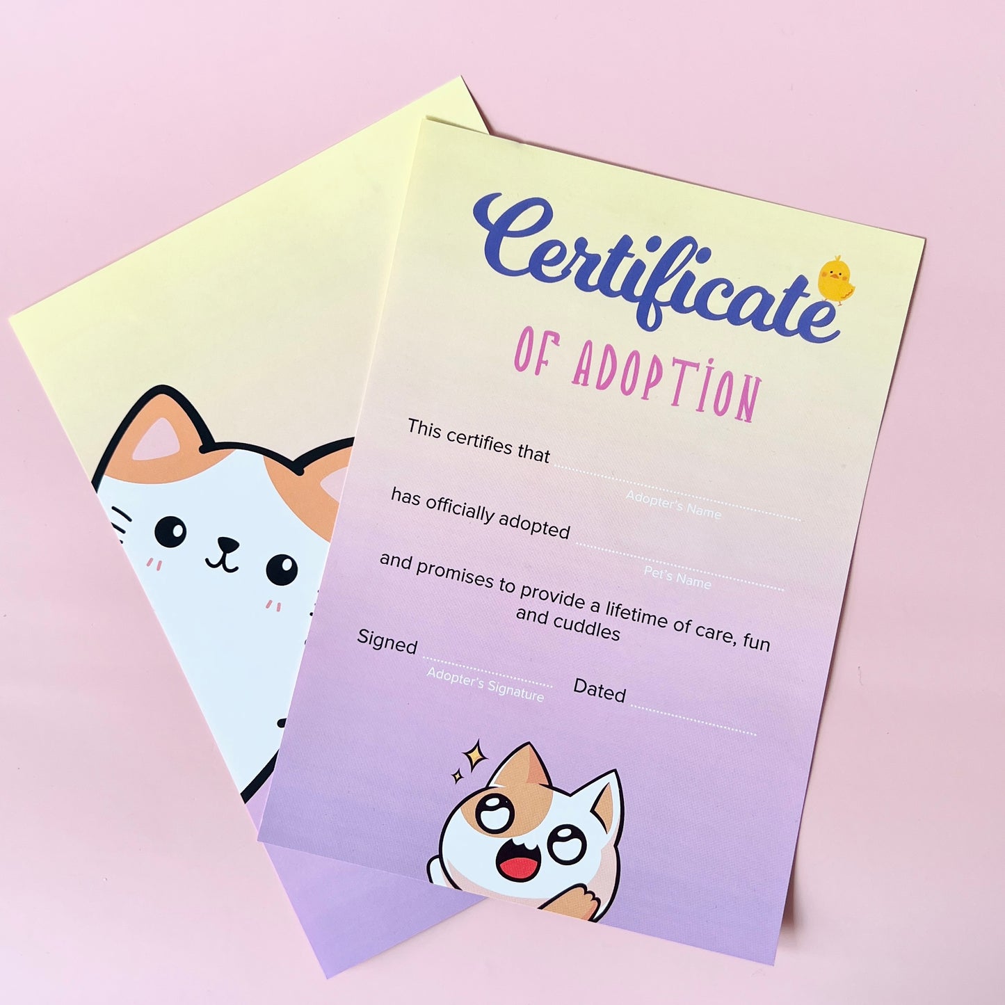 Colorful adoption certificate featuring a cute cat illustration and spaces for names and signatures.