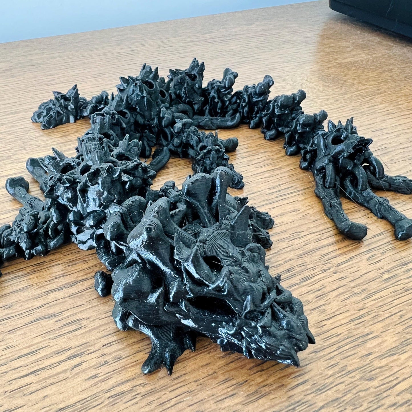 A hollow, skull-like dragon with intricate details, exuding an eerie charm and dark fantasy allure.
