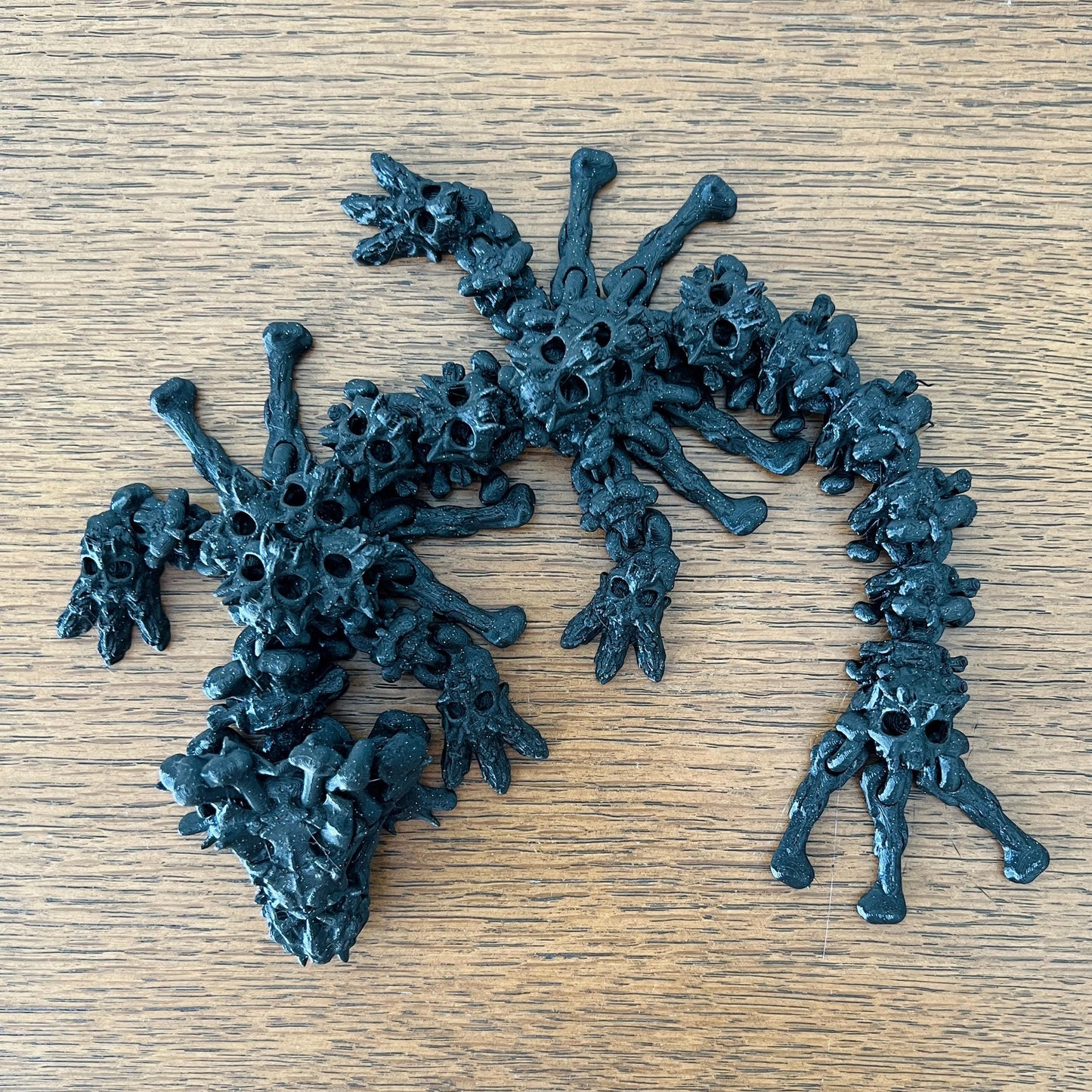 A unique hollow dragon with skull-like features, showcasing intricate details and a mysterious, wingless form.