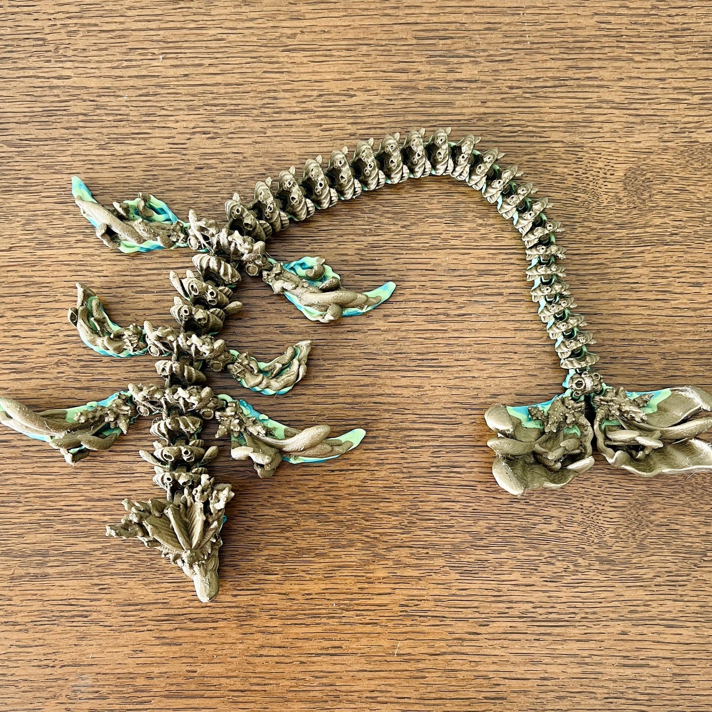 Majestic Coral Dragon with intricate details and vibrant ocean hues, perfect for fantasy enthusiasts and collectors.