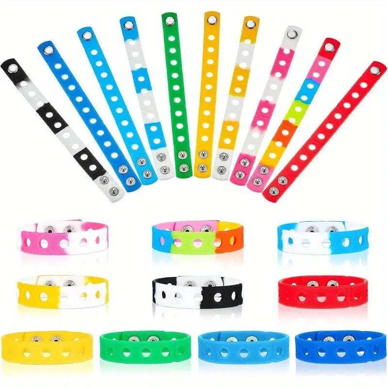 Colorful silicone wristbands in various styles, perfect for personalizing with charms for fun and stylish wear.