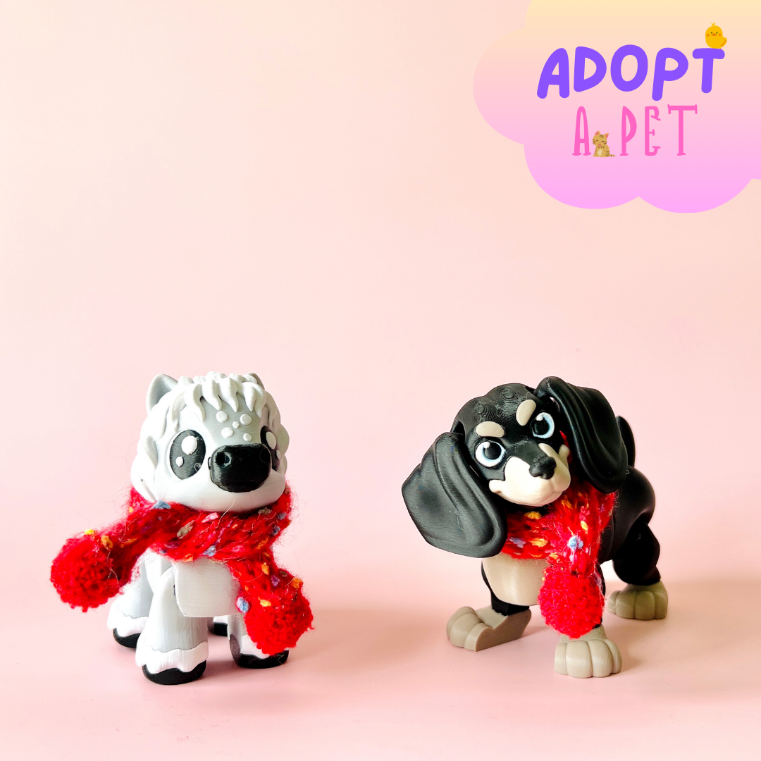 Two whimsical figures wearing bright red scarves, set against a soft pink background with playful text above.