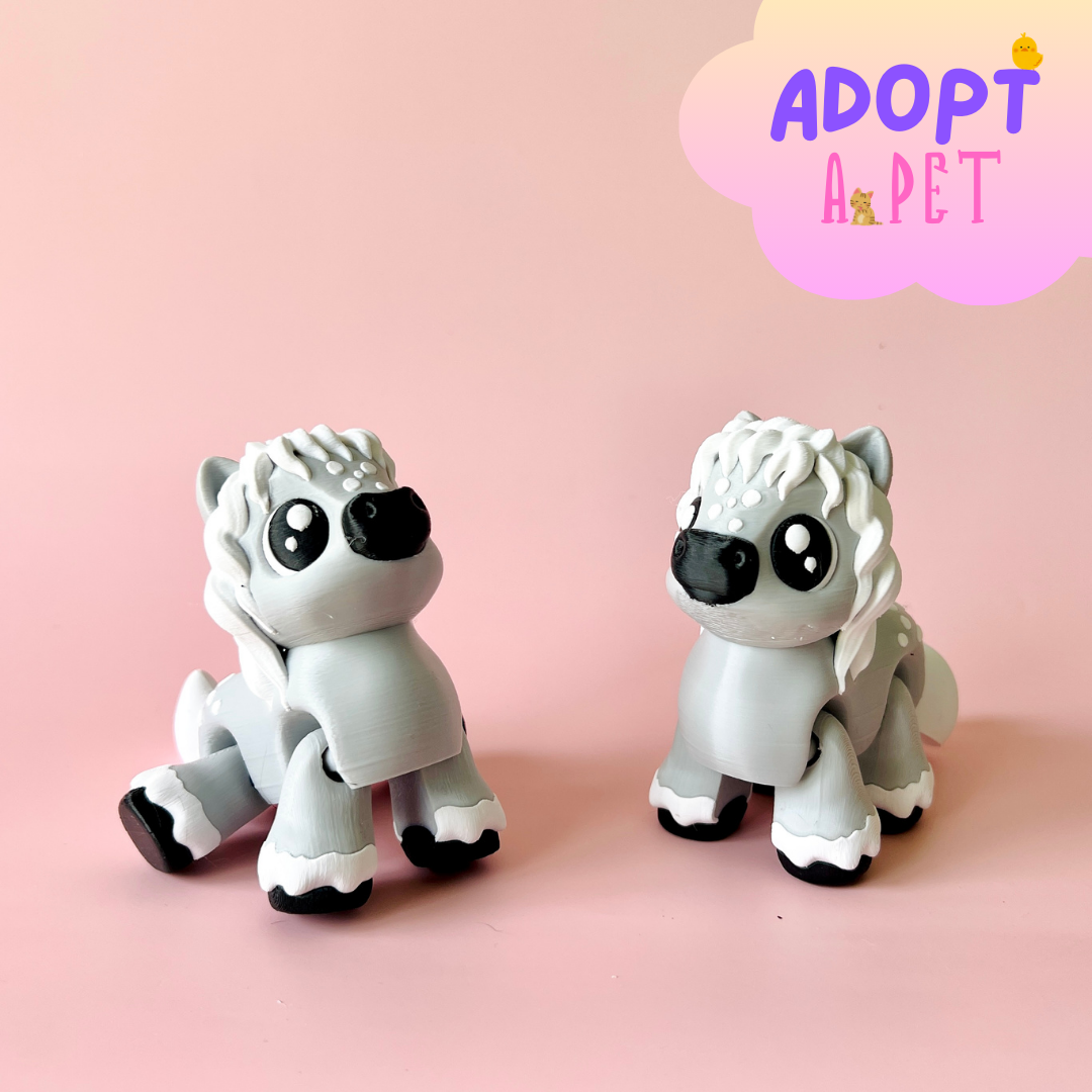 Two adorable gray figures with playful expressions, set against a soft pink background.