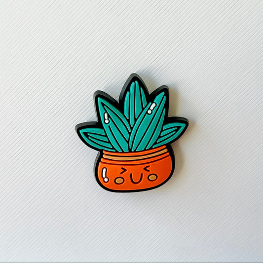 Colorful plant illustration with a smiling face in an orange pot against a textured white background.