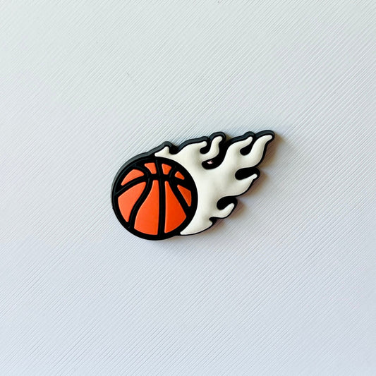 A fiery basketball graphic featuring orange and black colors, set against a textured white background.