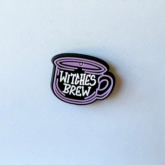 Purple cup with the words "Witches Brew" in white, set against a textured white background.