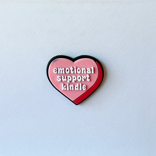 Heart-shaped graphic featuring the text "emotional support kindle" in bold white letters on a pink and red background.