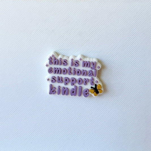 Text in playful purple font reads, "this is my emotional support kindle," with a small butterfly illustration.