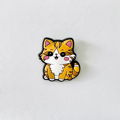 Adorable sitting orange cat charm with a sweet expression, perfect for adding feline fun to your shoes!