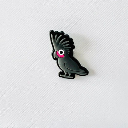 Black cockatoo charm with bold black feathers and a pink cheek, perfect for shoe embellishment and bird lovers.