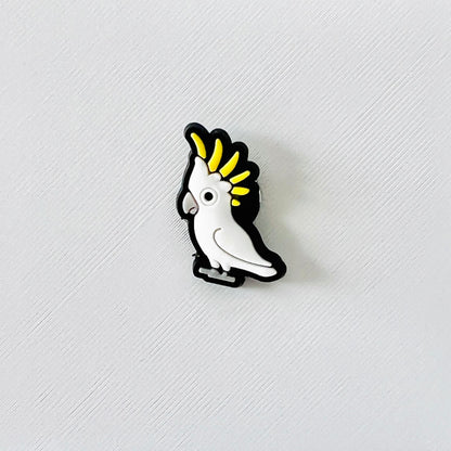 Bright sulphur-crested cockatoo charm with a playful expression and vibrant yellow crest, perfect for shoe decoration.
