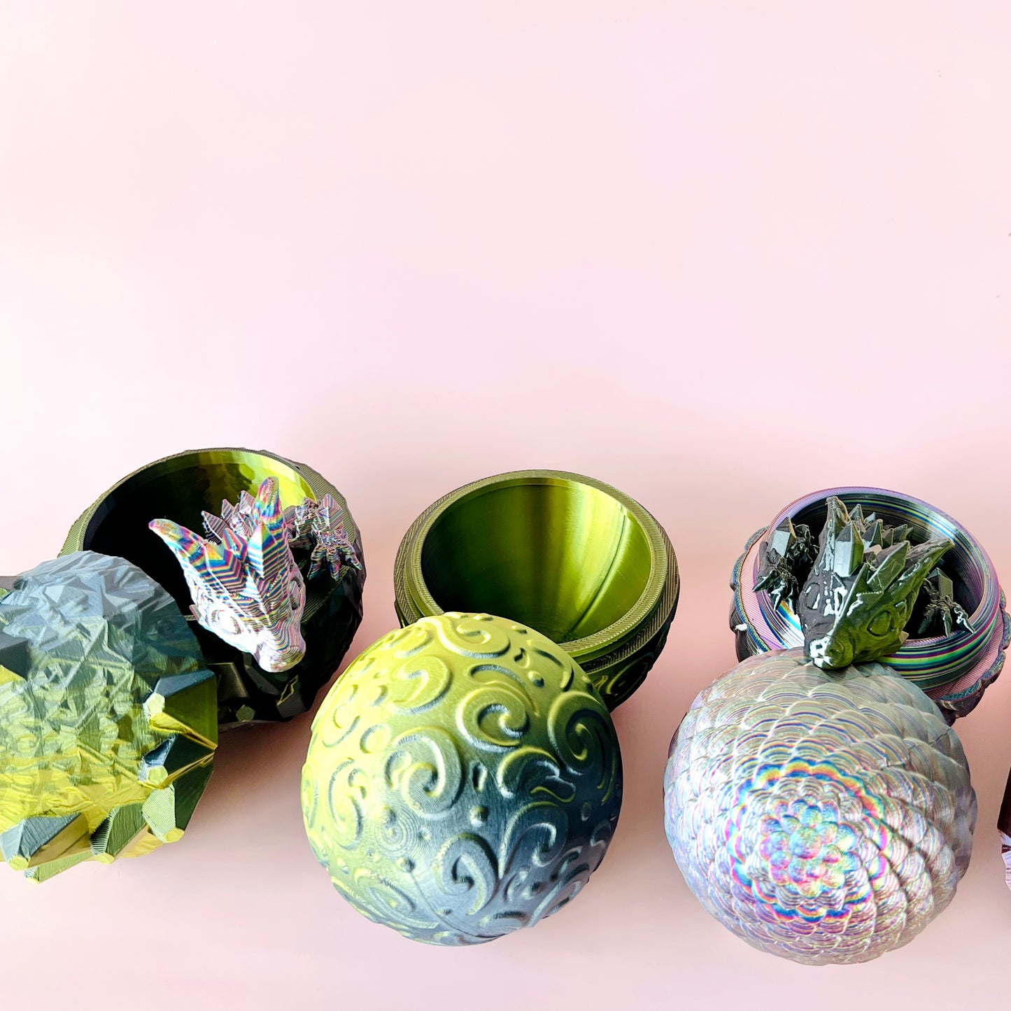 A vibrant Crystal Wolf Dragon Tadling with customizable eggs in various textures and colors, set against a soft pink backgrou