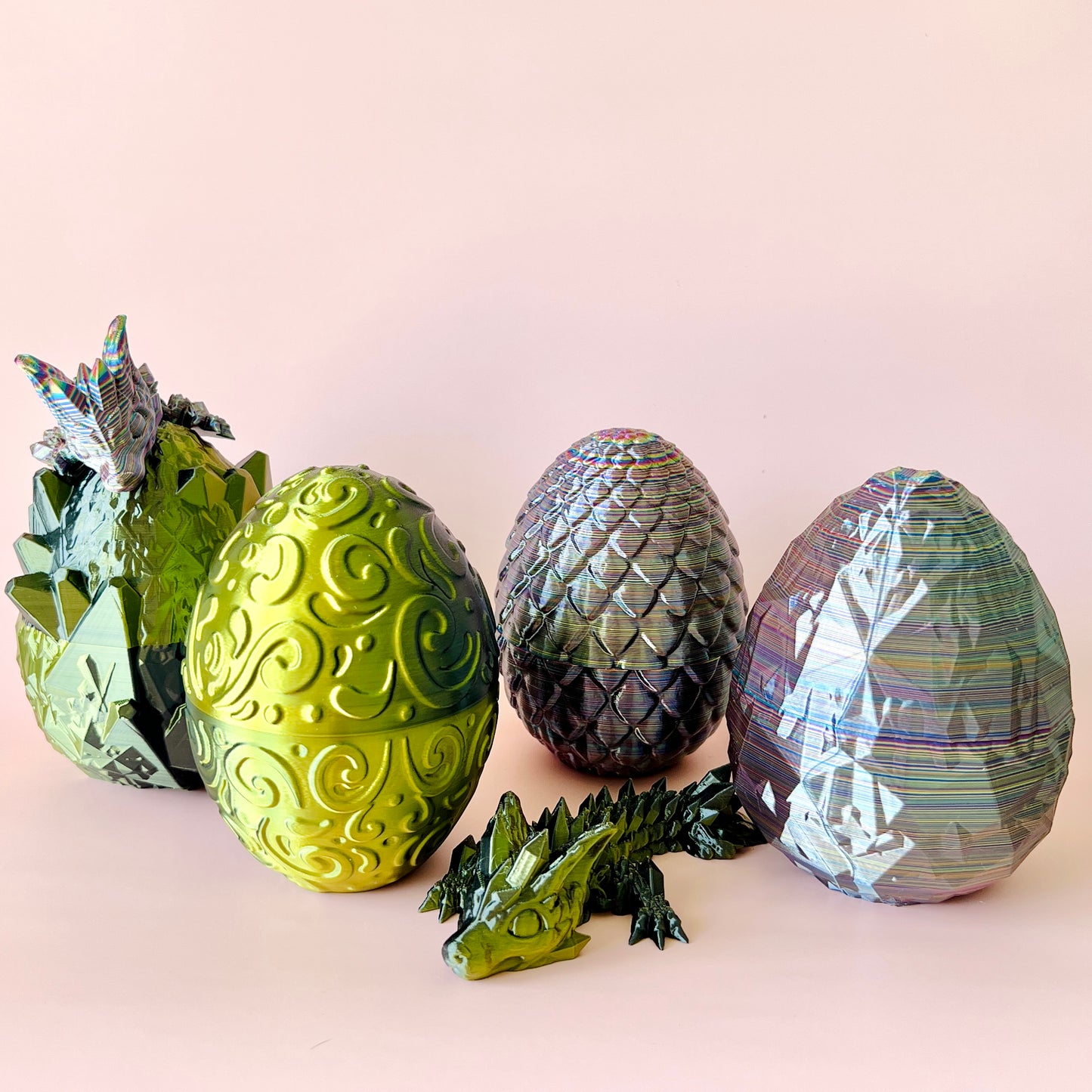 Colorful 3D-printed dragon and customizable eggs, featuring intricate textures and designs, perfect for imaginative play.