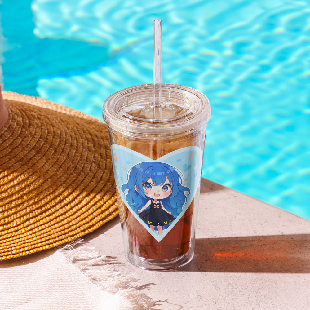 Clear tumbler showcasing a blue-haired chibi character in a heart, set by a pool with a straw and iced drink.