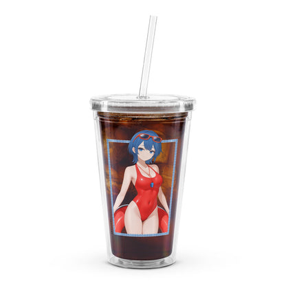 Clear tumbler featuring a character in a red swimsuit, with a straw and a colorful liquid inside.