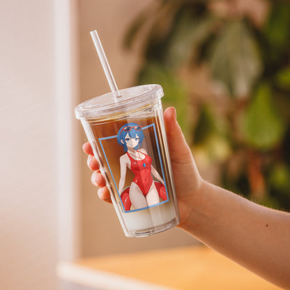 Clear plastic tumbler featuring a character in a red swimsuit, held in a hand with a straw, set against a blurred background.