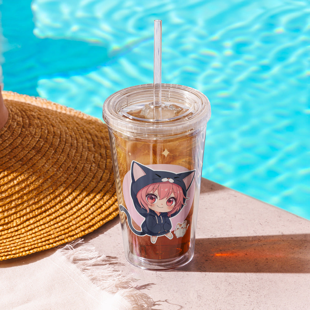 Clear tumbler featuring chibi kitty girls on both sides, perfect for cat lovers, with ice-cold drink by a pool.