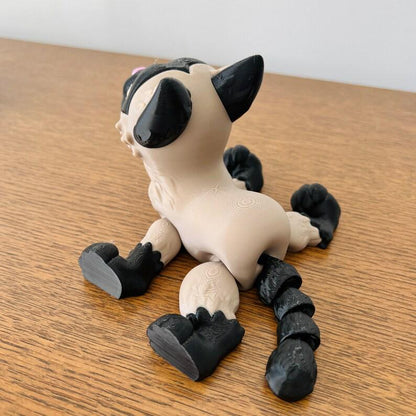 3D-printed Siamese cat figurine with sleek features, black ears and paws, perfect for feline enthusiasts and collectors.