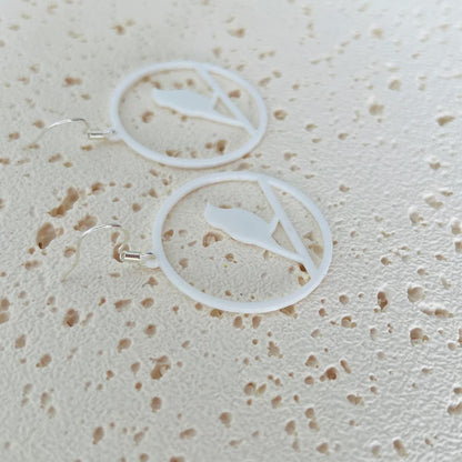 Elegant white bird dangle earrings with 925 sterling silver hooks, perfect for any occasion. Lightweight and stylish.