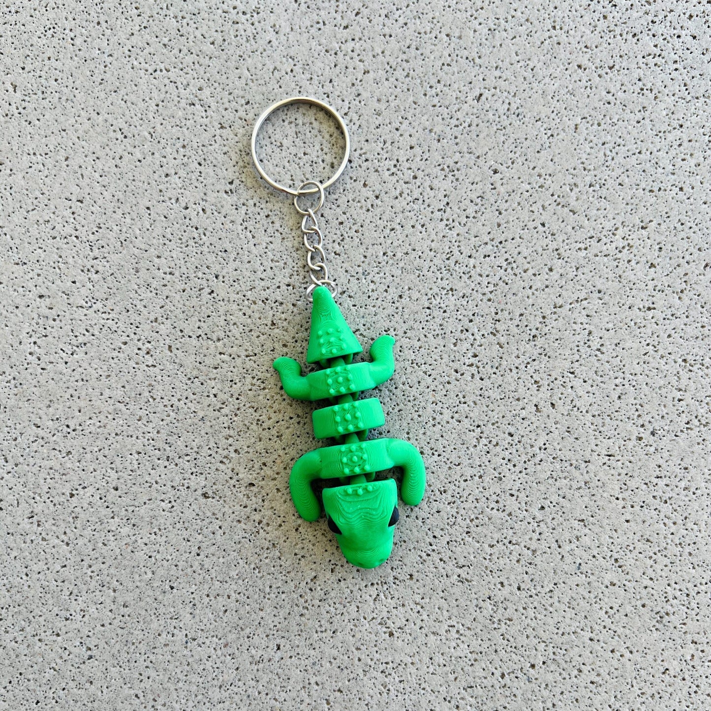 Bright green crocodile keychain with playful details, perfect for adding flair to keys or bags. Ideal for gifting!