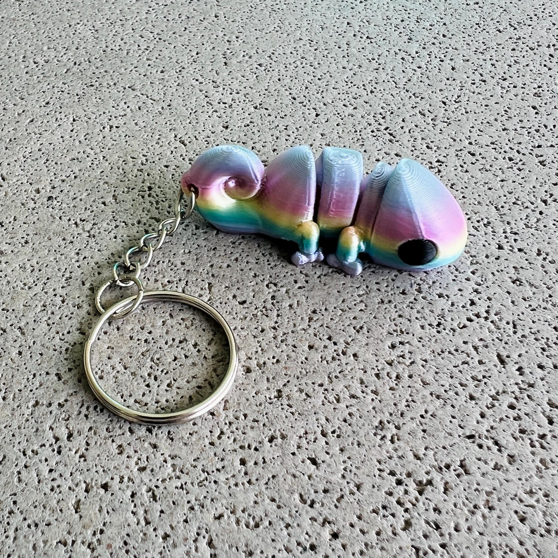 Colorful chameleon keychain with a whimsical design, perfect for adding flair to keys or bags.